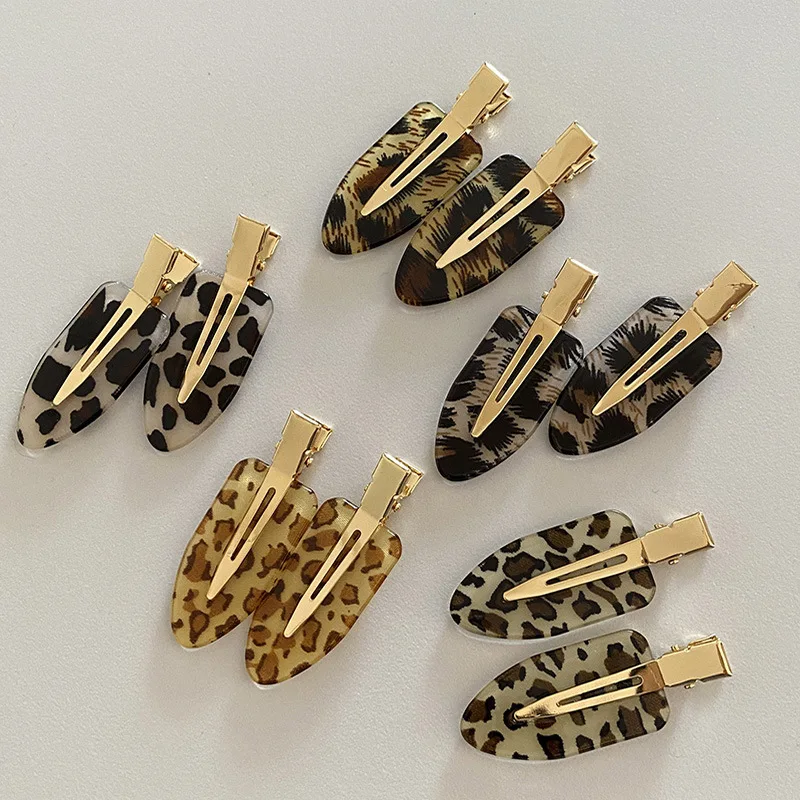 Korean version of retro fashionable leopard print seamless oval hairpin personalized versatile makeup edge clip hair accessories