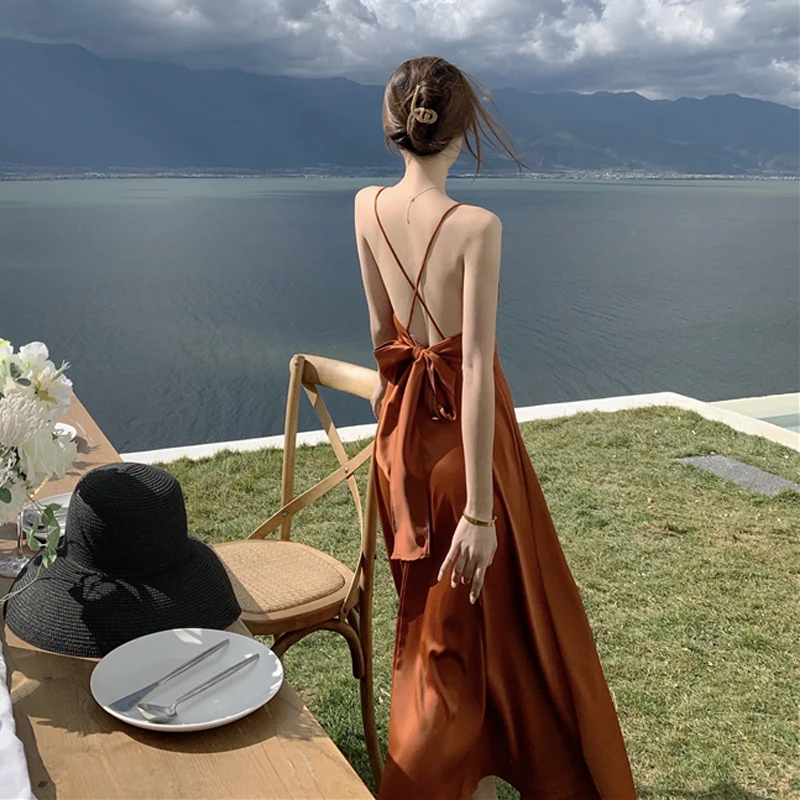 Vestido blanco de tirantes finos para mujer, vestido playero Sexy de verano, sin mangas, con lazo y cordones, elegante, sin espalda