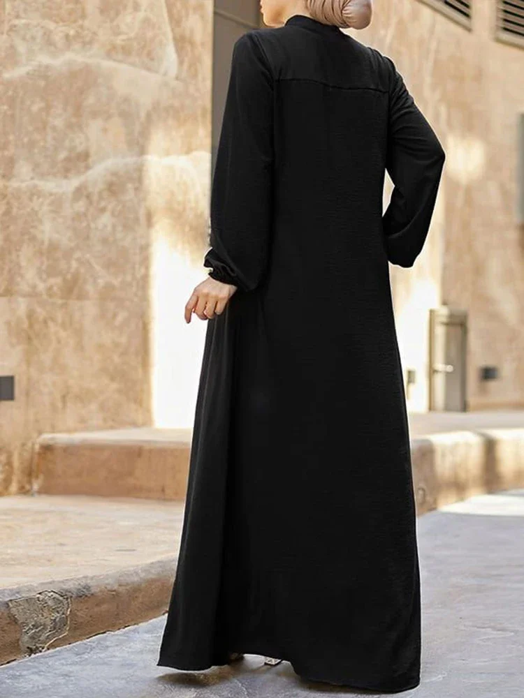 Muslim black dress with small stand-up collar and zipper pocket design  elegant loose and casual long-sleeved skirt