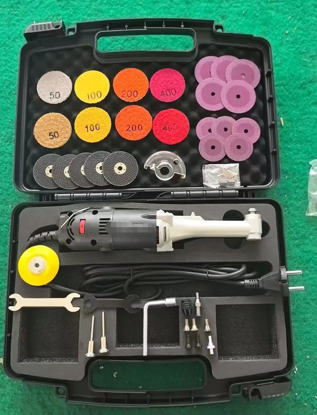 

beautiful sewing artifact, special cutting and slotting floor tiles for tool tiles, electric grinding and sewing machine