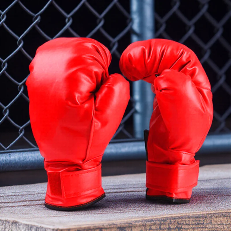 1 زوج قفازات الملاكمة المهنية للأطفال Pu Sparring Gear تنفس كيك بوكسينغ قفازات التايلاندية قفازات الملاكمة العرض