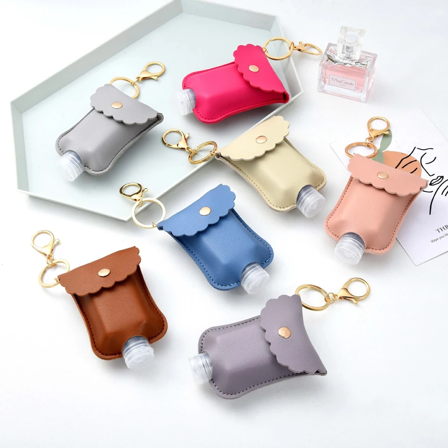 2.03 oz Travel Hand Sanitizer Storage Bag - Faux Leather Keychain Pouch Suitable for Keys and Outdoor Use.