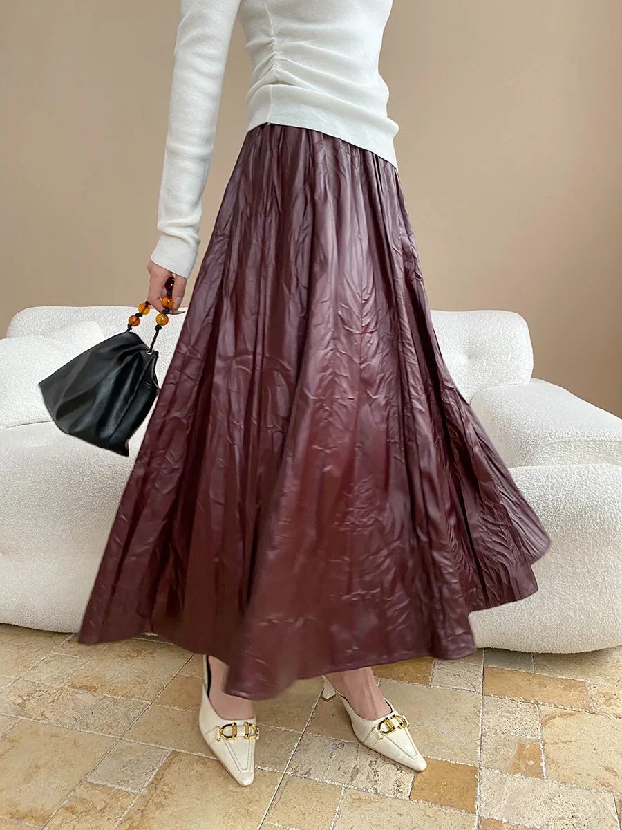 Early autumn new light luxury texture pleated PU leather elastic waist A-line leather skirt half skirt