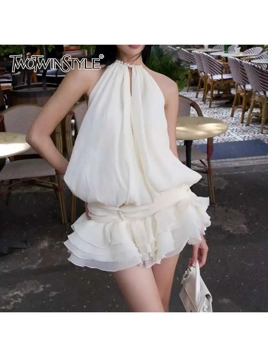 

TWOTWINSTYLE Solid Spliced Pearl Hollow Out Dresses For Women O Neck Sleeveless High Waist Temperament Mini Dress Female Fashion