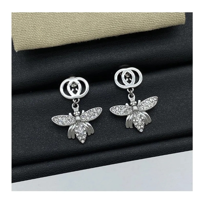

Home New Products Butterfly Diamond Stud Earrings Premium Letter Earrings Women's Needle Seiko