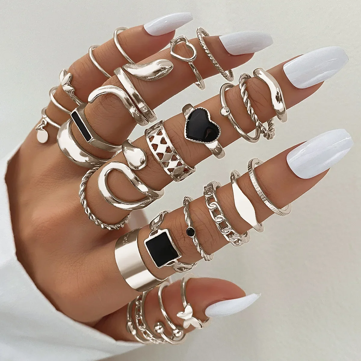 27 Stück vergoldete Herz Schlange Schmetterlings ringe Set für Frauen Metall geometrische hohle Fingerring Schmuck Weihnachten Neujahr Geschenk