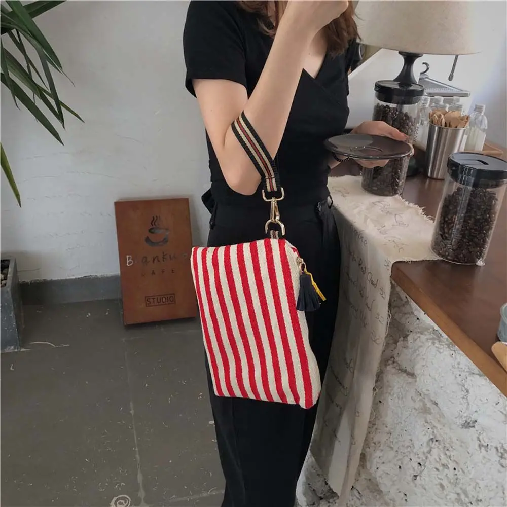 Fashion tas perlengkapan mandi portabel pola bergaris kantong kosmetik kanvas tas tangan Korea tas kanvas bergaris tas Makeup tas kosmetik