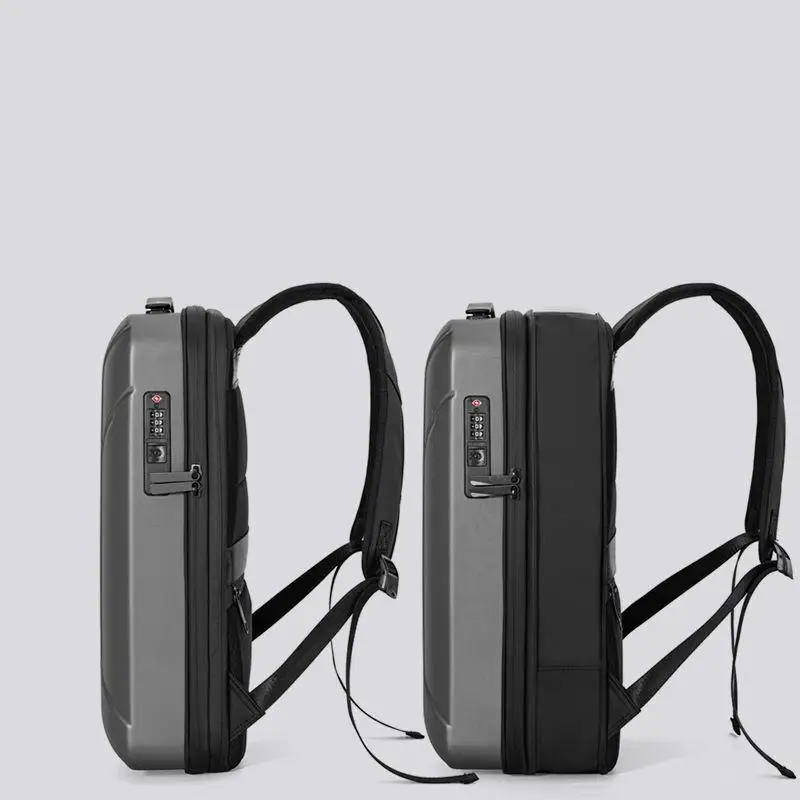 ใหม่กระเป๋าเป้สะพายหลังเปลือกแข็งผู้ชายความจุขนาดใหญ่กันน้ําคอมพิวเตอร์ e-sports กระเป๋าเป้สะพายหลังขยายได้พักผ่อน USB กระเป๋าเดินทางป้องกันการโจรกรรม