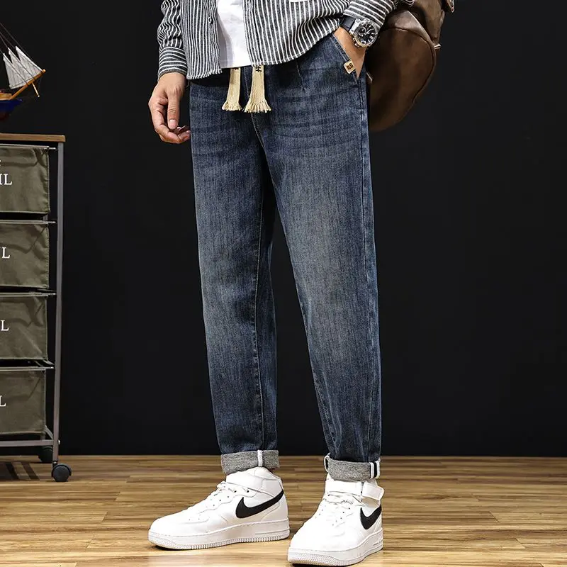 جينز خريفي وشتوي مقاس كبير بخصر مطاطي للرجال، فضفاض بأقدام صغيرة ورباط بالإضافة إلى بنطال هارون متعدد الاستخدامات