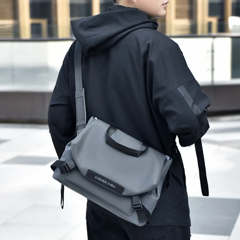 

Cross-border best-selling men's waterproof messenger bag, portable business travel shoulder bag with premium feel.
