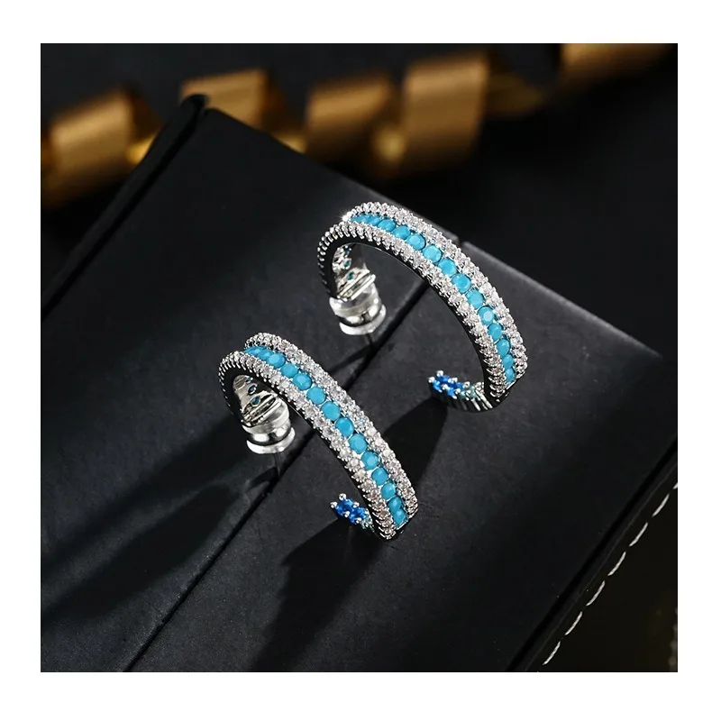 

Light Luxury Fashion Retro Temperament Semi-round Turquoise Earrings Niche High Sense Daily Commuting Versatile Earrings