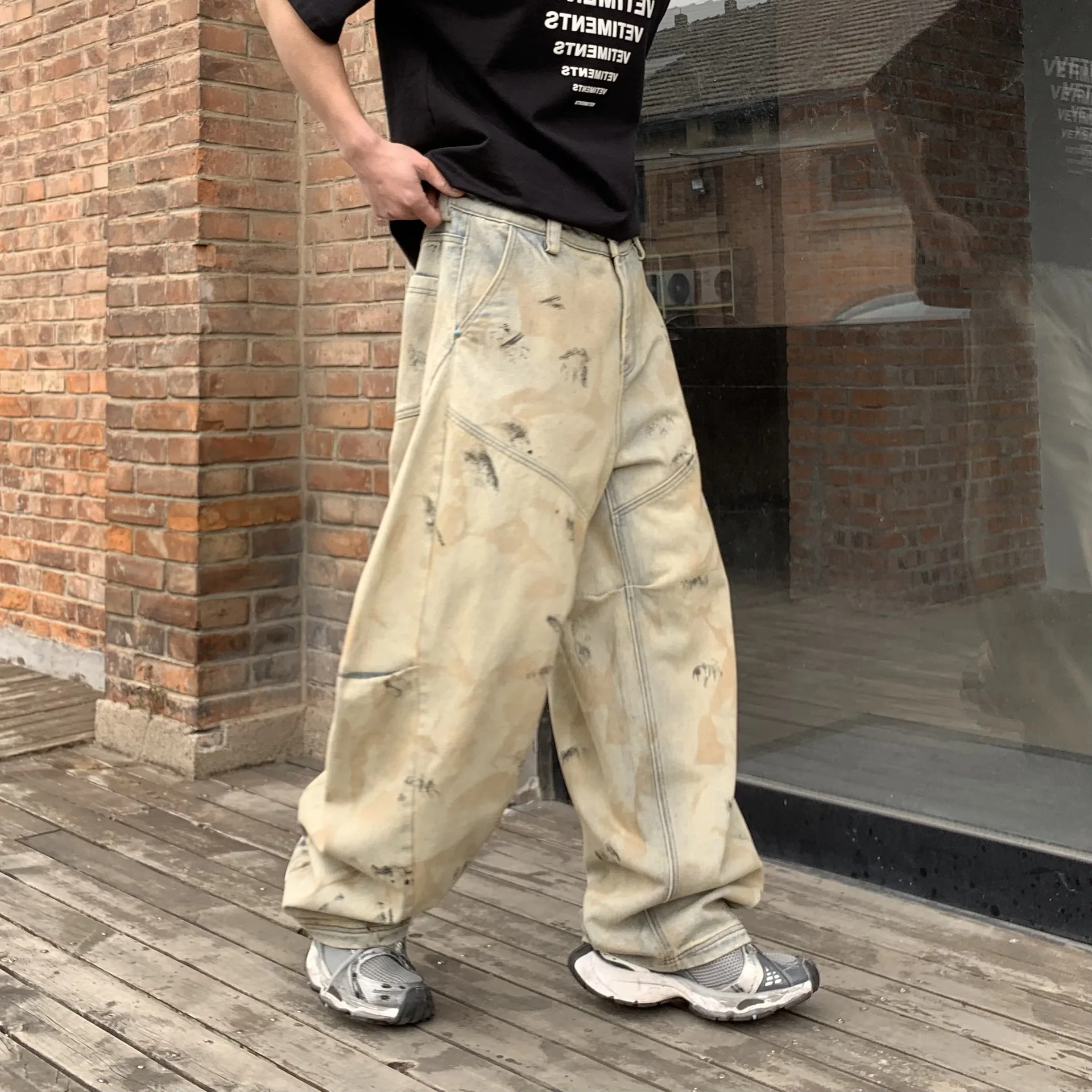 2025 nuevos pantalones vaqueros desgastados lavados para hombres, moda Retro americana, pantalones holgados de pierna ancha con dobladillo curvo, pantalones de diseño industrial pesado para mí