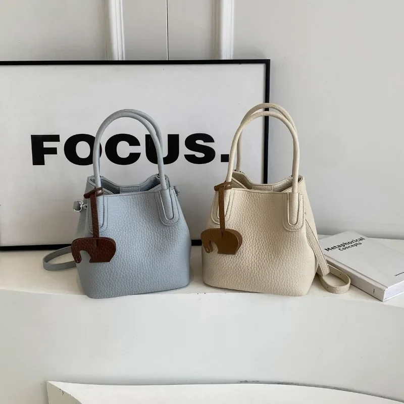 

2025New Women's Fashion Bucket Bag - Minimalist Shoulder Purse with Lychee Texture, Unique Handheld Tote for Daily Use
