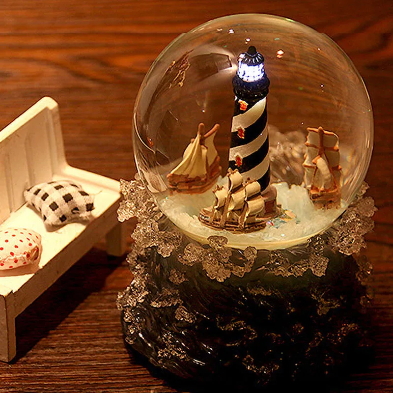 Resin Lighthouse Sailboat Crystal Ball Rotate Music Box Simulated Wave Base Birthday Gift Living Room Bedroom Home Decoration