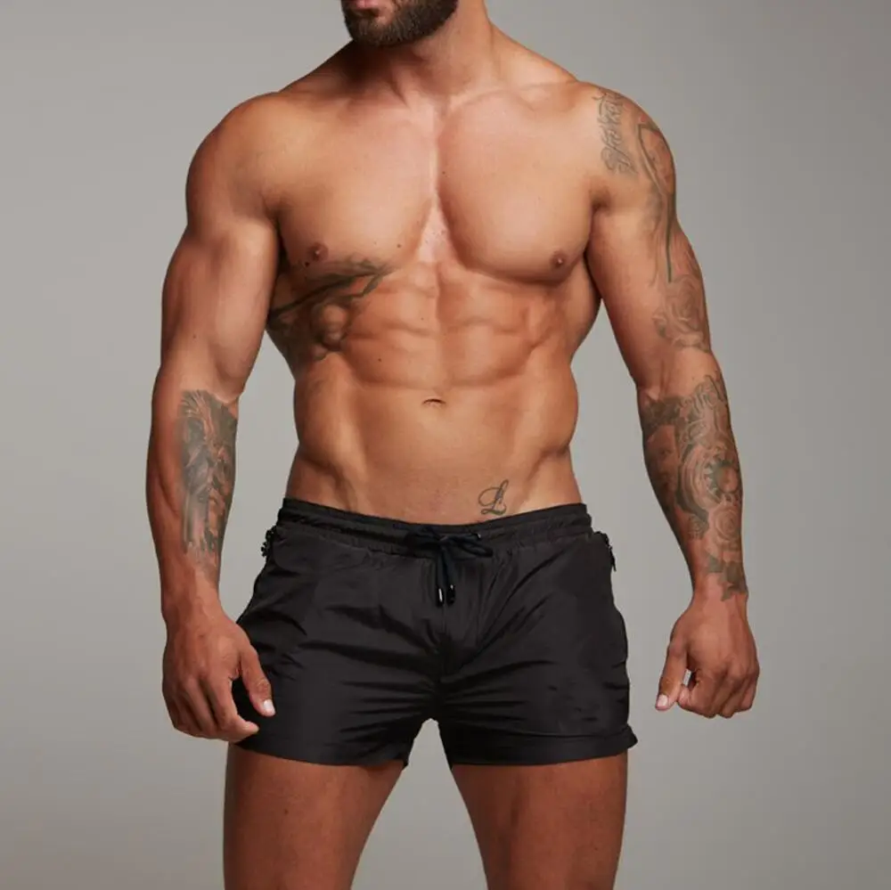 

Men Swimming Trunks Elastic Waist Beach Board Shorts Summer Sports Swimwear Sea Surfing Leisure Short Pants Men's Bathing Shorts