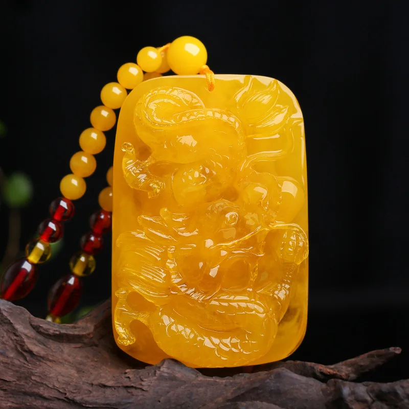 Ancient peace , carved amber dragon pendant, long sweater chain necklace, other items