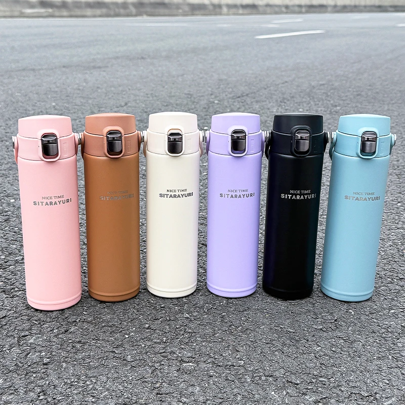 Botella aislada de acero inoxidable con tapa Pop-Up para bebidas directas de 500 ml con asa ancha