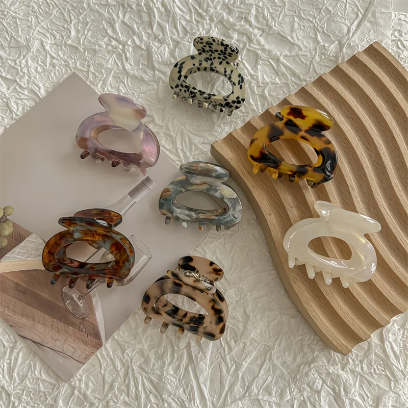 

Elegant Sweet Small Oval Hair Claw Clip for Women Tortoiseshell Solid Colors Ponytails Hair Clips Hair Accessories for Updos