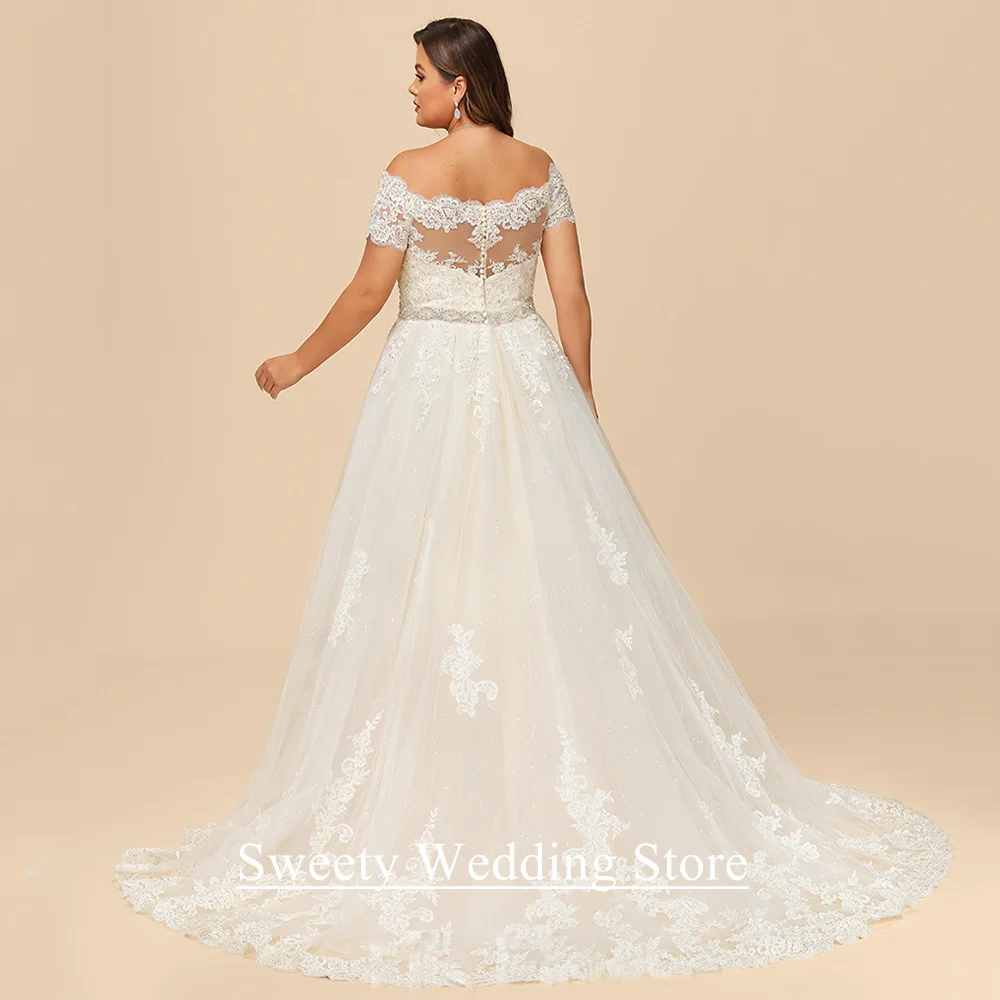 بالاضافة الى حجم فستان الزفاف مخصص قبالة الكتف الديكور مطرزة زين الوهم عودة زيبر أزرار بريق ثوب الزفاف