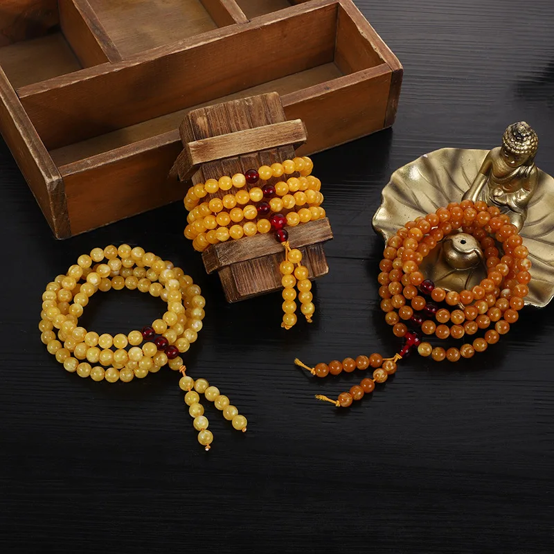 Factory Direct Sales Second Generation Amber Beeswax108Beads Bracelet Hot Selling Bracelet Yellow Chicken Grease New and Old Bee