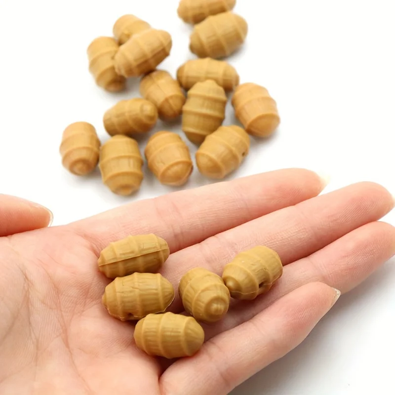 12 señuelos flotantes de pesca de carpa Tiger Nut - Pellets artificiales marrón claro con protector de maleza verde, diseño pop-up
