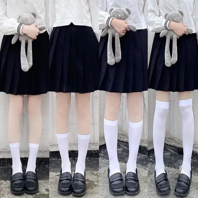 Calze lunghe bianche nere di colore solido calze JK Japan Style School Girls calze autoreggenti Lolita Kawaii Cute calze al ginocchio