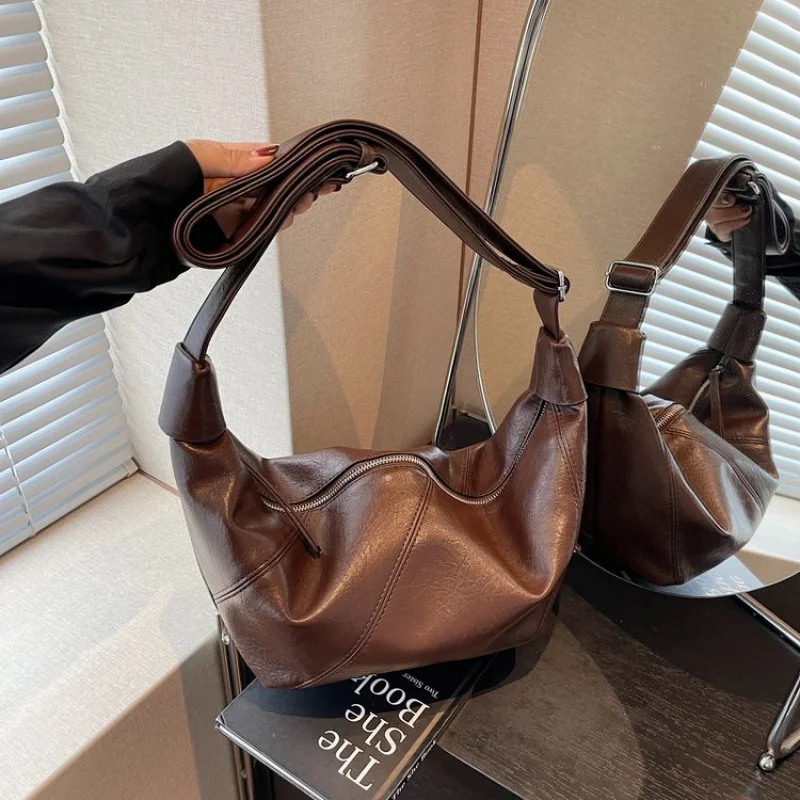 

High-End Women Hand Bag With Casual Simple Vintage Vibe And Luxury Brand Details Boasting Classic Designer Paris Appearance​