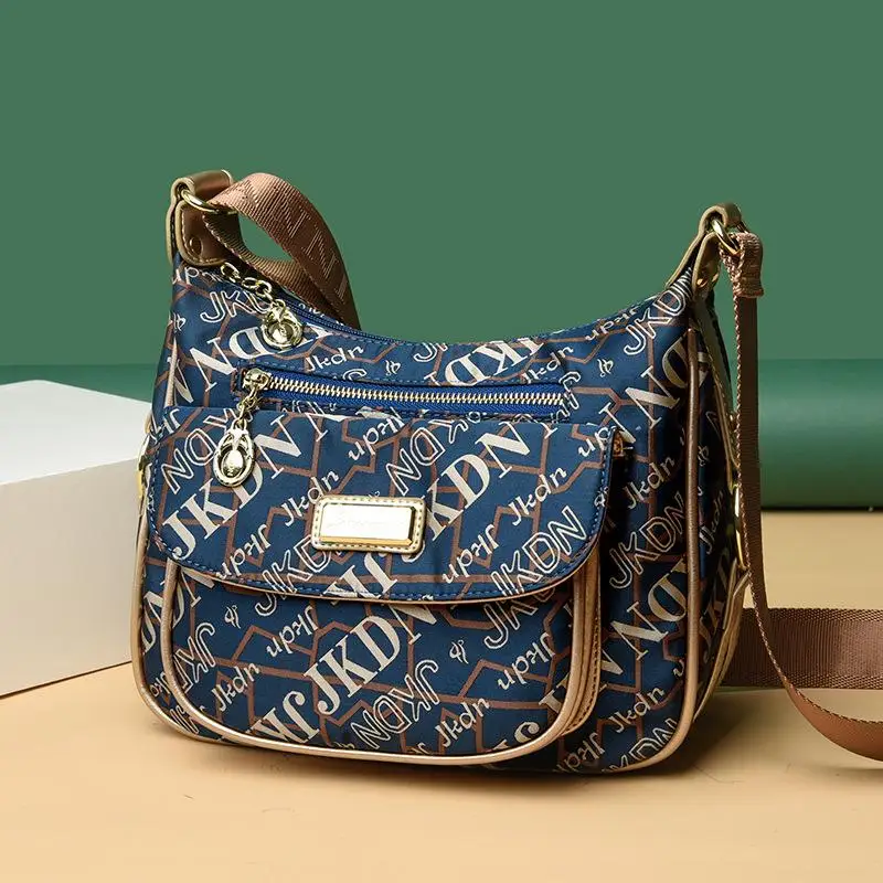 

AS828 2025 Spring New Bag Large Capacity Printing Middle-aged Lady Mother Bag Multi-compartment