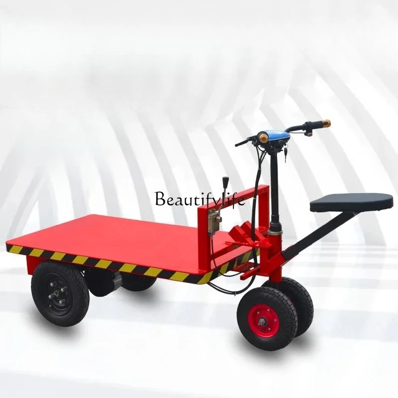 

ls 41Small forward and backward riding electric flatbed truck pulling truck load handling