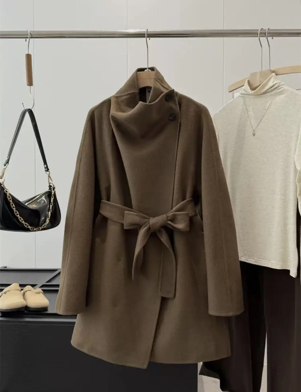 

Original high-quality 2026 new style, featuring a 50% wool high-neck and belted wool blend coat for women