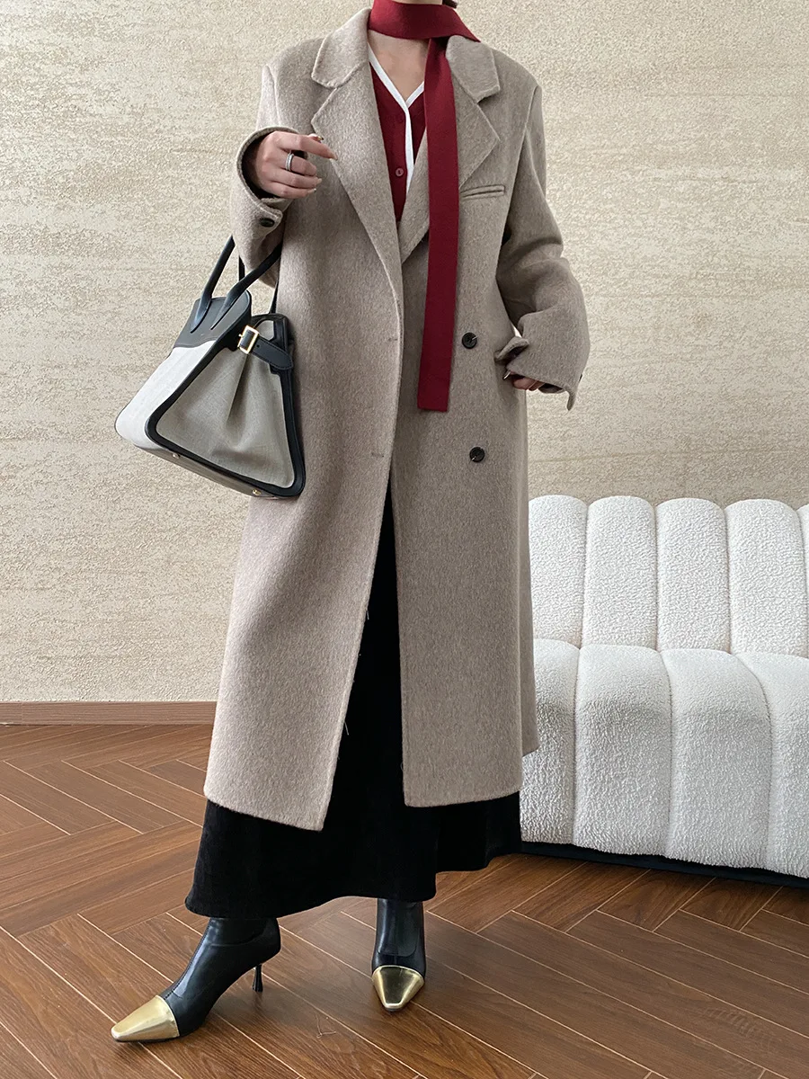 Winter women\'s casual solid color lapel long sleeved pocket decoration loose long coat