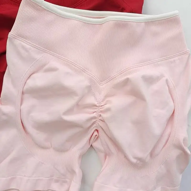 Sport- und Fitnessanzug Weste Kontrastfarben Stoßdämpfender Sport-BH Hochgeschnittene Atmungsaktive Peach-Hip Dreiteilige Shorts-Set – Detail 23