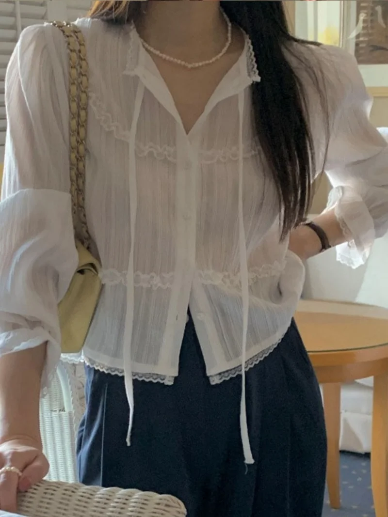

Chic ort Spring irt Design Sense Lace Trim Belted Splice Bubble Sve Thin Sun Protection Top Women's Korean Sle Loose...