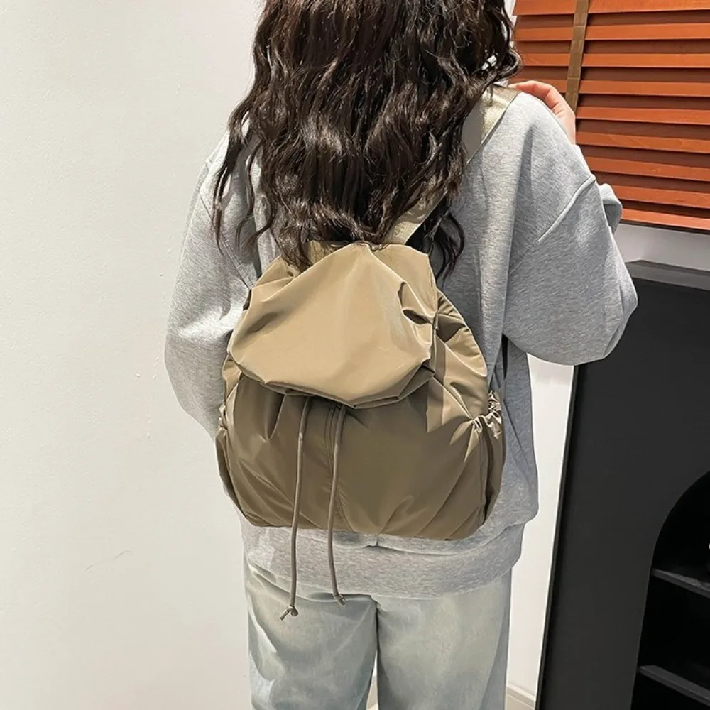 

Lightweight Solid Color Drawstring Backpack Flap Pleated Nylon Backpack Korean Style Large Capacity Sports Shoulders Bag Girls
