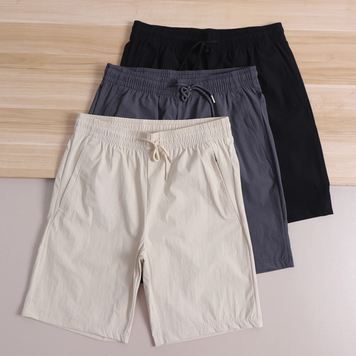 

Outdoor Summer Cool Feeling Quick Dry Sports Shorts Breathable Moisture Wicking Drawstring Five-Quarter Length Casual Versatile