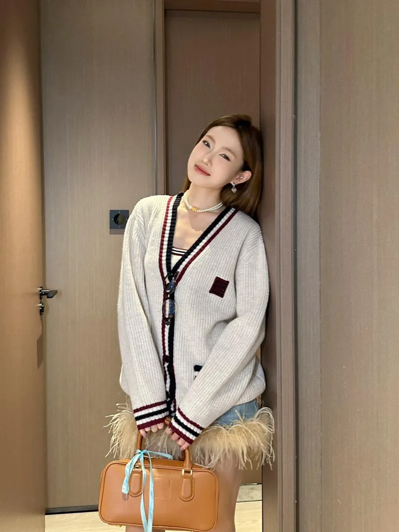 Lazy women\'s sweater fashionable loose casual contrasting color striped edge long sleeved knitted cardigan mid length