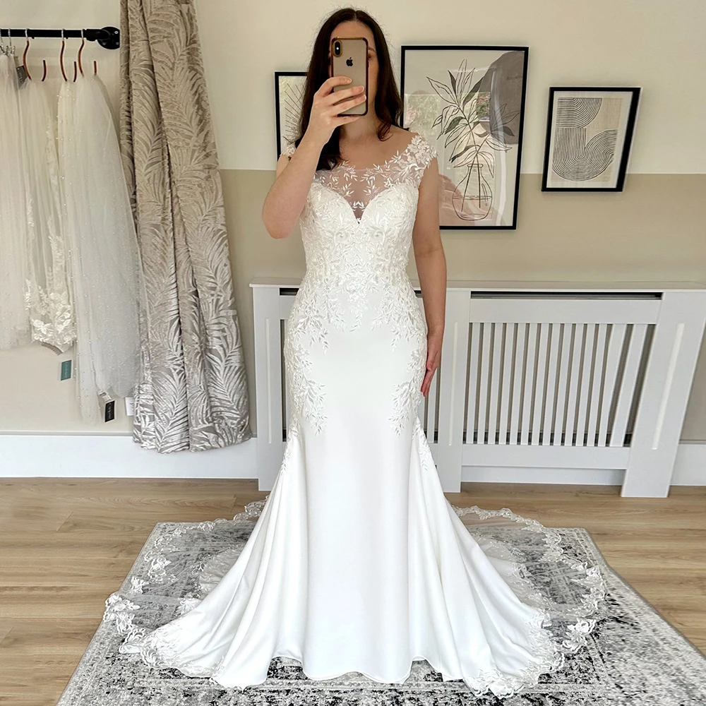 Abiti da sposa personalizzati con applicazioni in jersey scoop maniche ad aletta abiti da sposa a sirena con strascico in pizzo con bottoni sul retro realizzati su misura