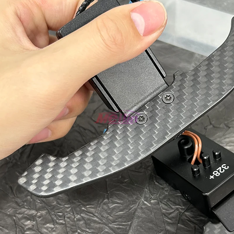 The new steering wheel magnetic shift paddles for BMW F10 F20 F30 F45 are made of dry carbon material