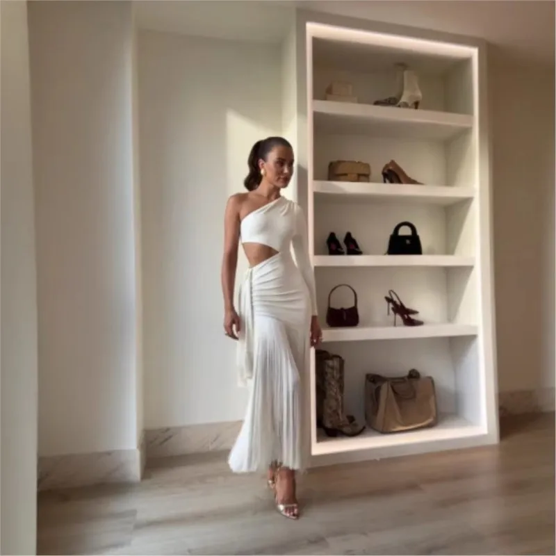 

Sexy Tassels Hallow Out Dress Women Fashion trend Simple White Long Sleeves Vestidos Female 2026 Chic High Waist Evening Dress