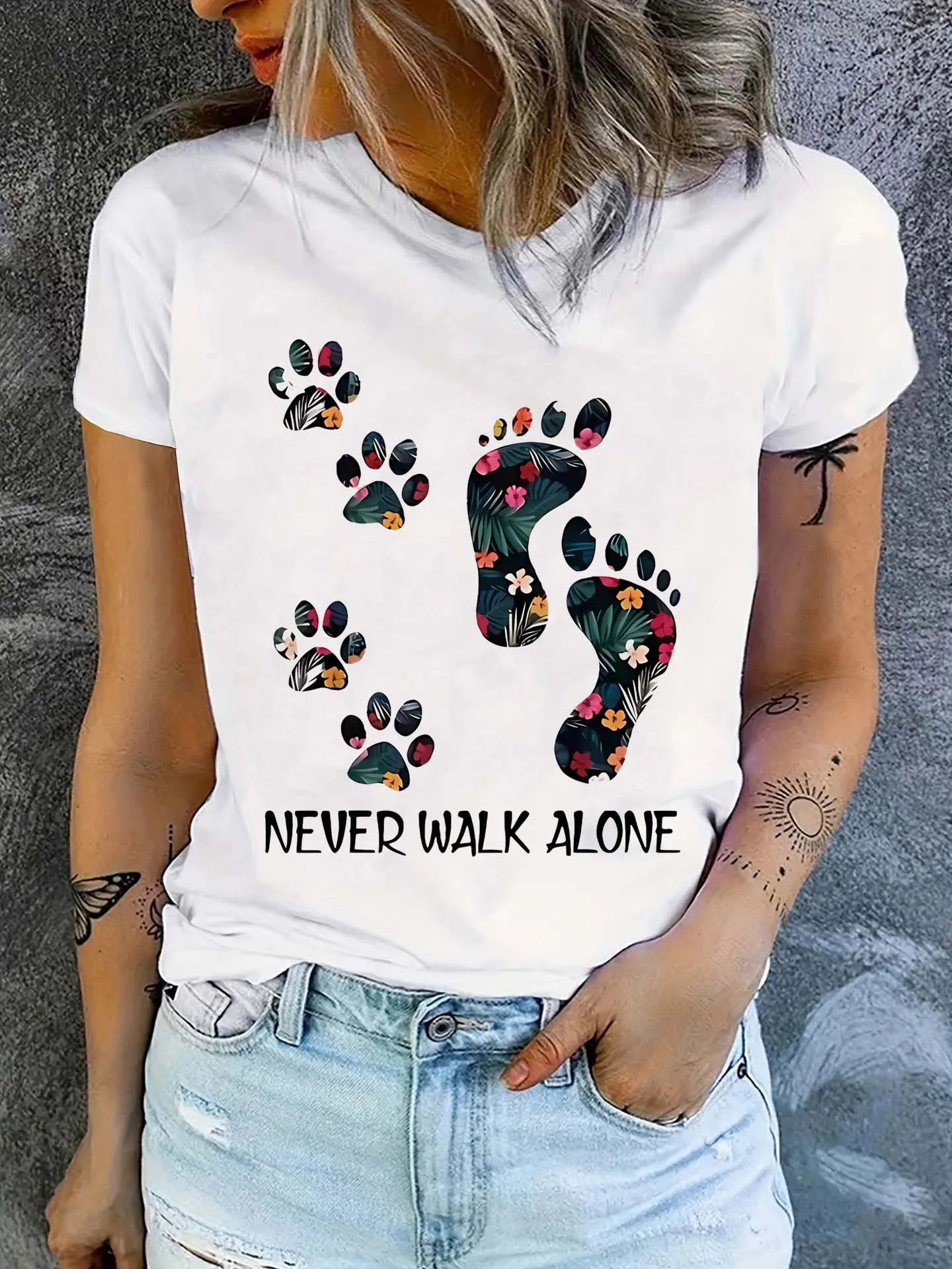 Never Walk Alone Women's Tee - Floral Paw & Footprint Graphic, Pet Lover Casual Top
