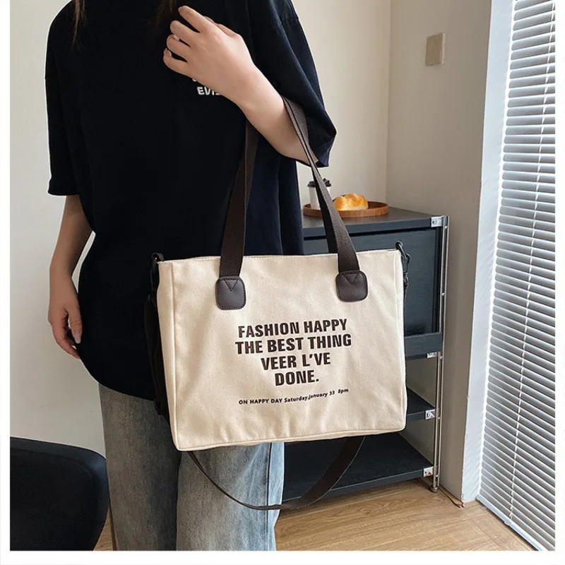 Tote borsa di tela di grande capacità stampa di lettere Design alla moda 2023 nuova borsa a tracolla a tracolla moda per studenti in stile Preppy Casual