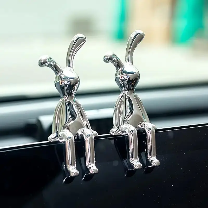 Two modern silver-plated resin rabbit figurines would be the perfect Easter gift for friends.