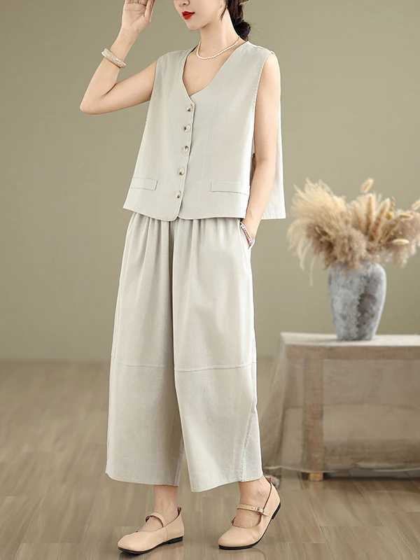 Modny komplet z czystej bawełny i lnu: top na ramiączkach z dekoltem w serek zapinany na guziki i spodnie o prostych nogawkach o długości 7/8 lub szerokich nogawkach, styl casual, dwuczęściowy...