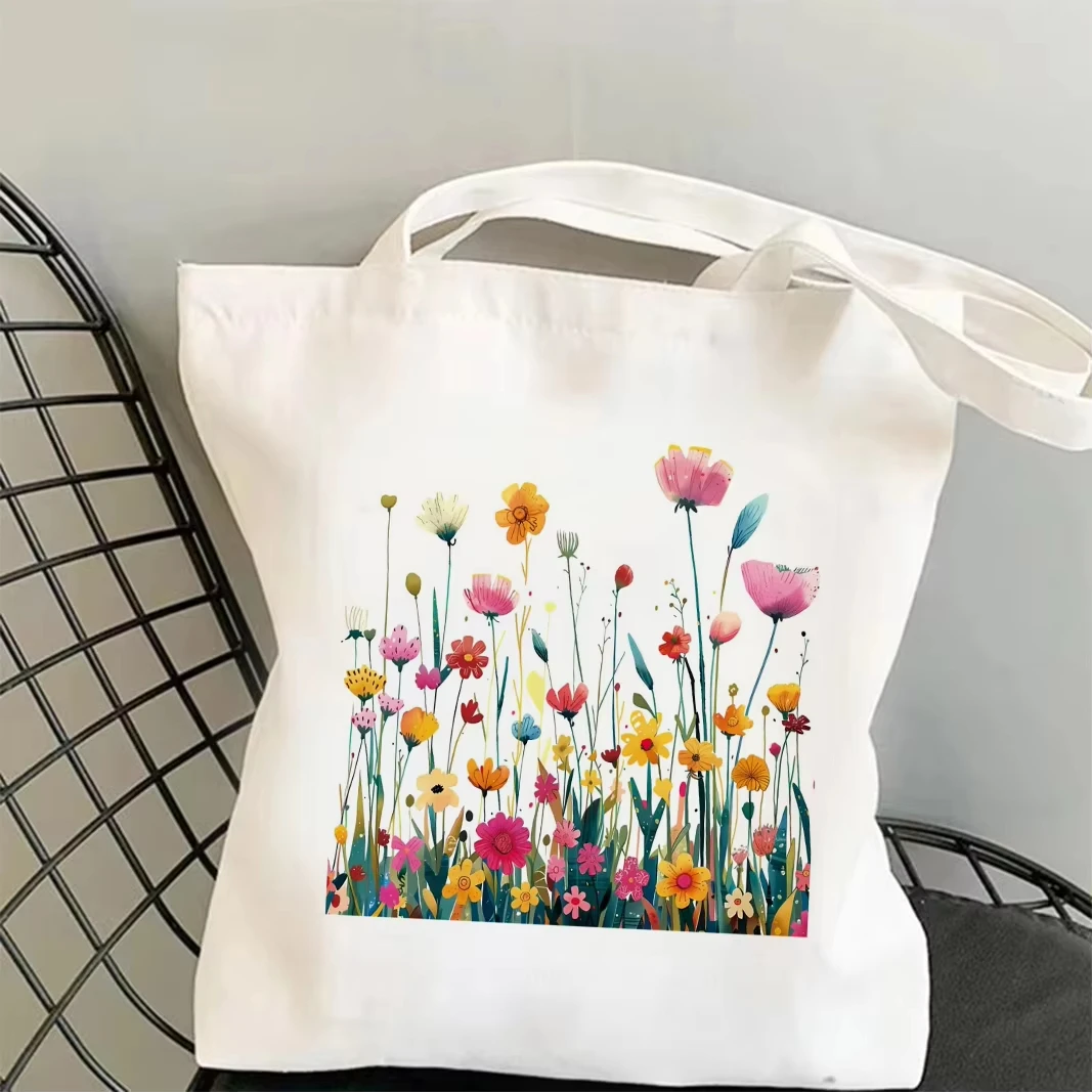 2026 A canvas handbag featuring simple grass patterns and floral designs, it is both fashionable and practical