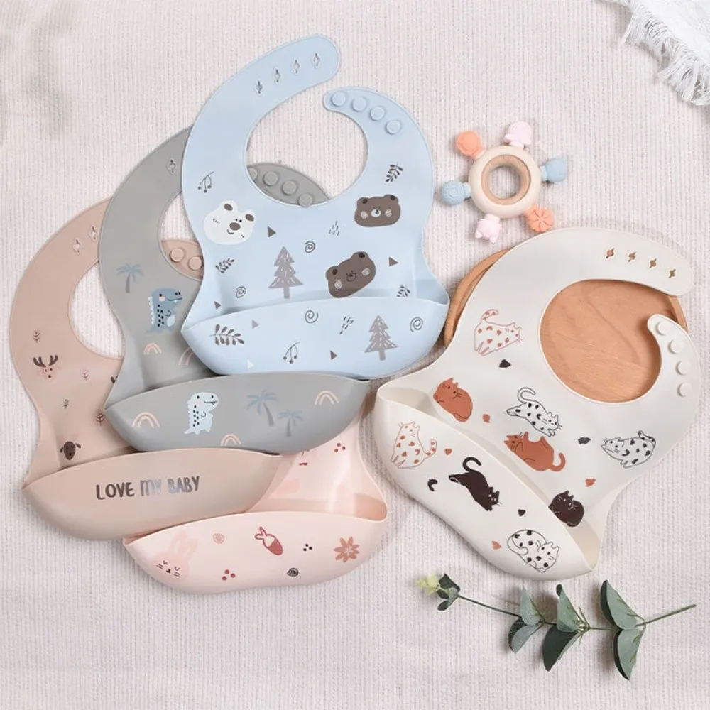 

Soft Baby Feeding Bib​ Skin-Friendly ​Easy to Clean​ ​Adjustable Drool Bib​ ​Fashionable Design​ ​Adjustable Neckband​