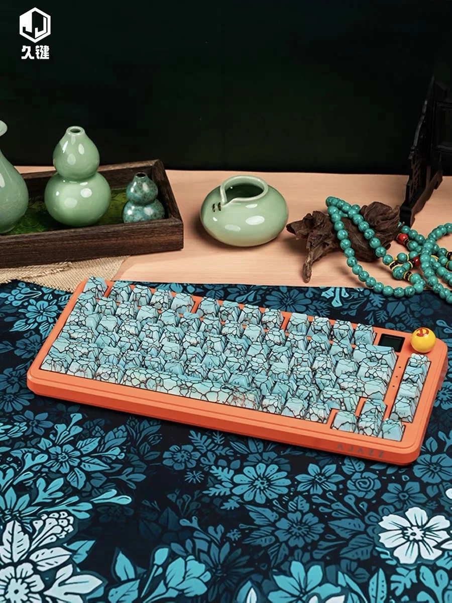 Turquoise crack-resistant ceramic keycaps with uniform light transmission on the side engraved keycaps.