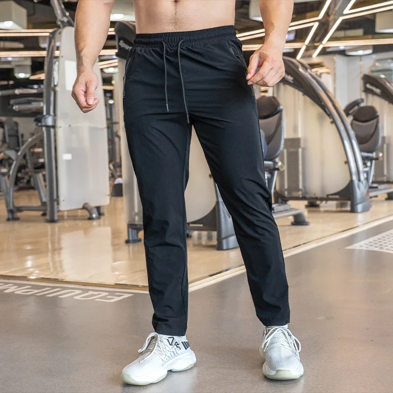 

Men's Basketball Fitness Workout Trousers Muscle Training Stretch Casual Golf Quick Dry Trousers with Drawstring Sweatpants