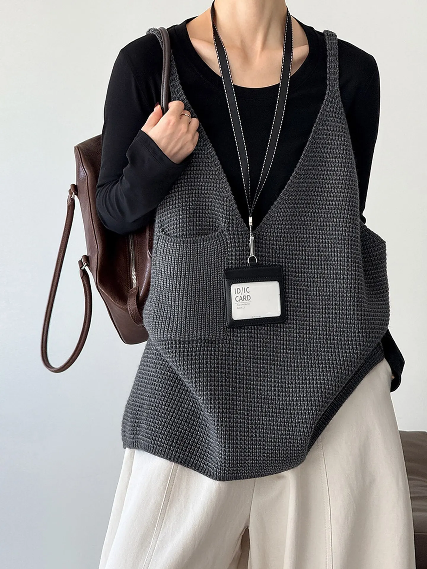 Colete de malha feminino na moda 2025 alça de ombro solto sensação outerwear Faionable Tank Top V-Ne mistura de fibra de poliéster