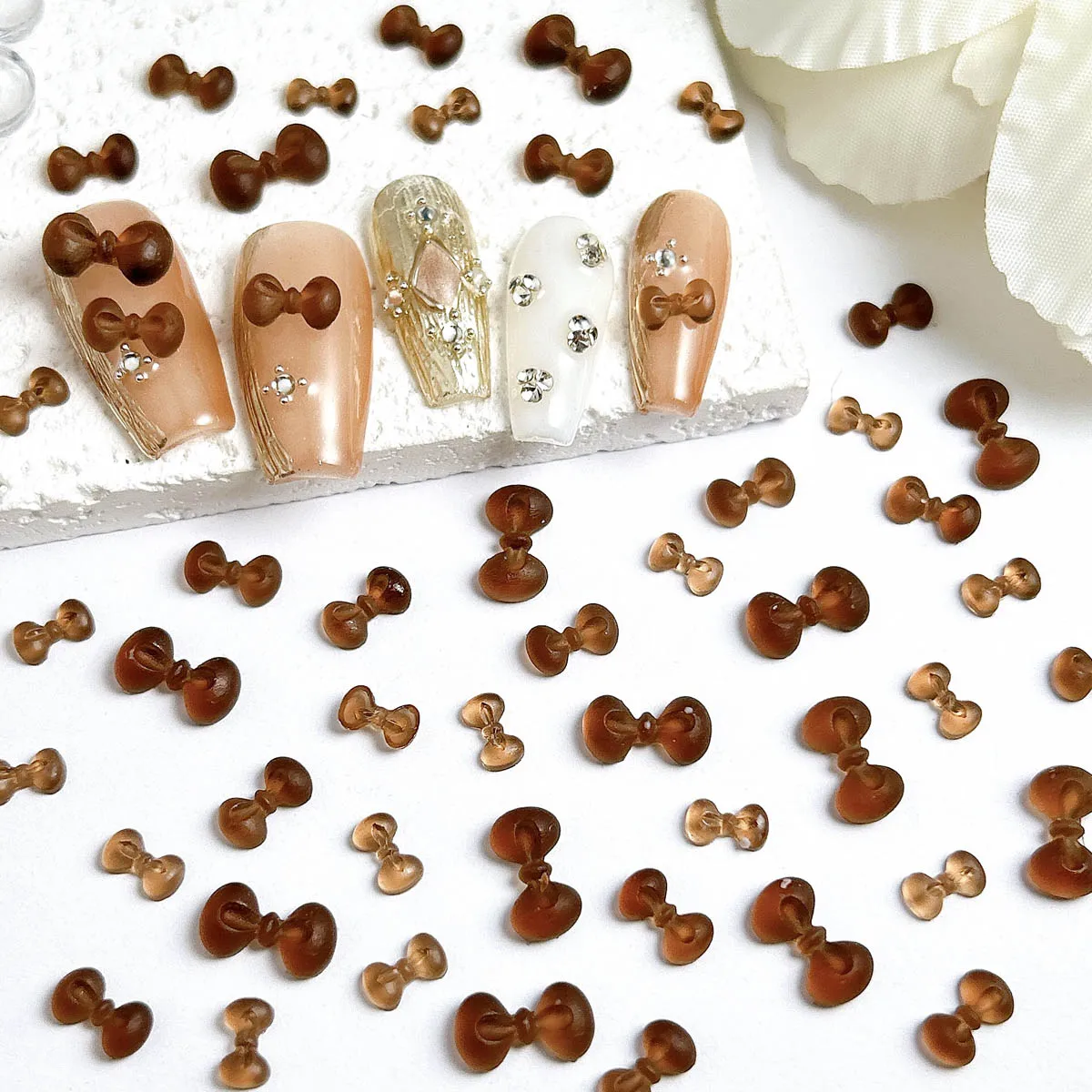 

50PCS Translucent Frosted Brown Tie Resin Nail Charms Creative Adorable Maillard Color Series Bow Nail Art Decorations for DIY