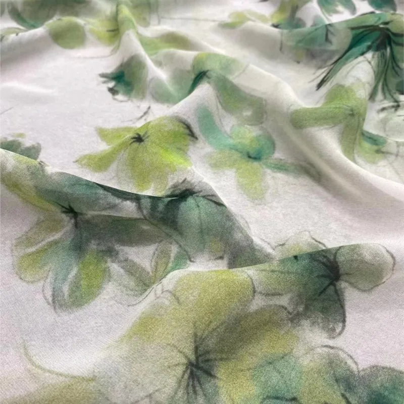 

New Summer green printed silk georgette fabric for a refreshing dress and shirt